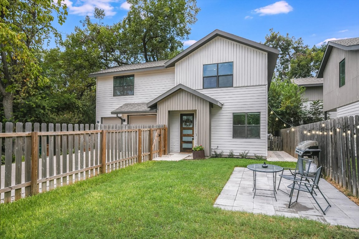 2414 East Martin Luther King Jr Boulevard, Unit A Austin, TX 78722 - Photo 10 of 32 a view of a house with a yard and sitting area