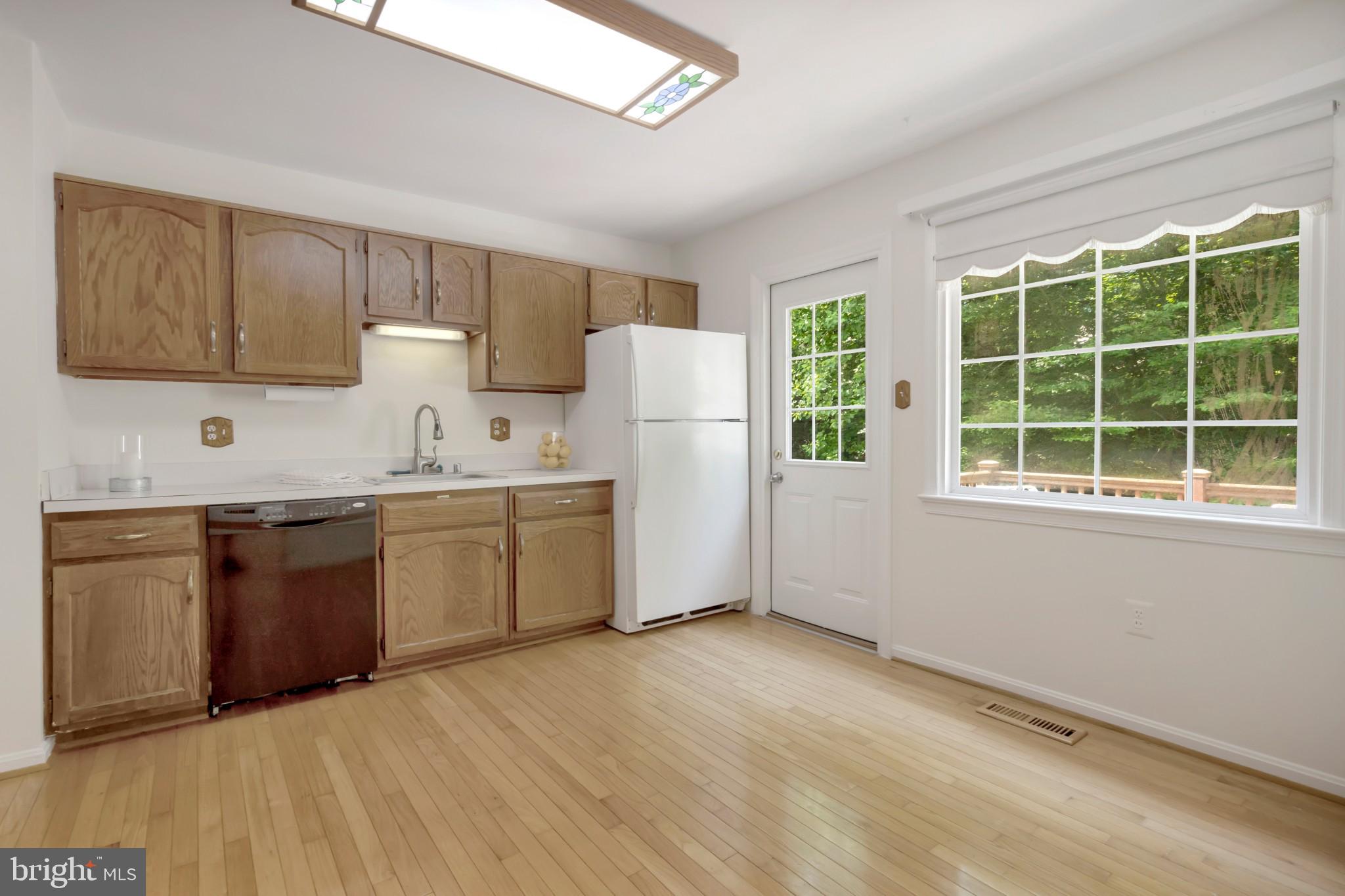 7628 Chancellor Way Springfield, VA 22153 - Photo 8 of 30 Kitchen overlooking back yard