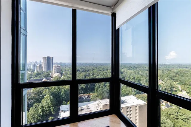 a view of a glass door with a balcony