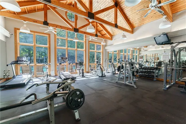 a view of a swimming pool with a patio