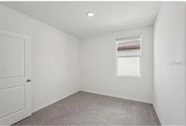 an empty room with a window