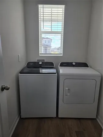 a utility room with dryer and washer