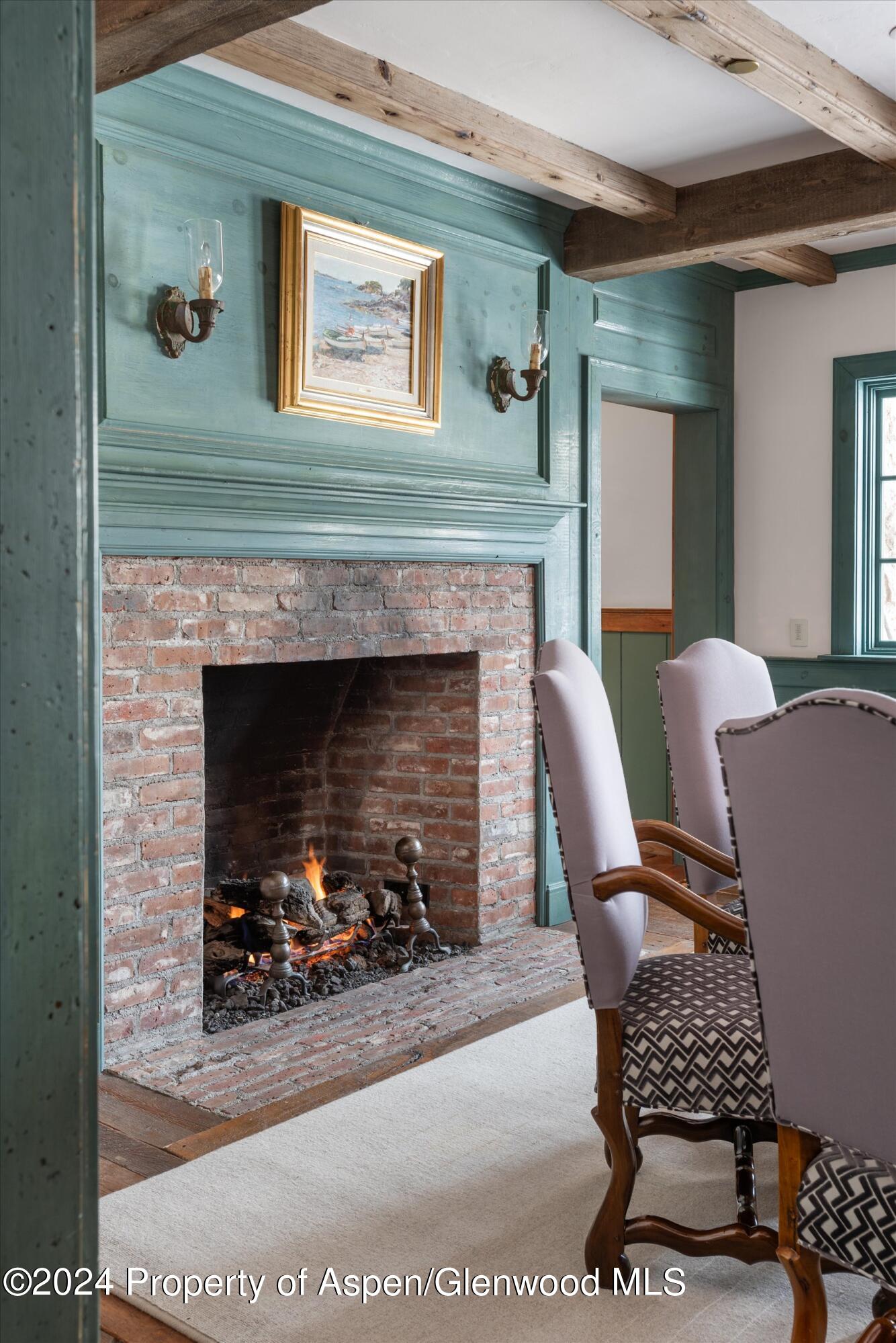 855 Moore Drive Aspen, CO 81611 - Photo 14 of 50 a living room with furniture and a fireplace