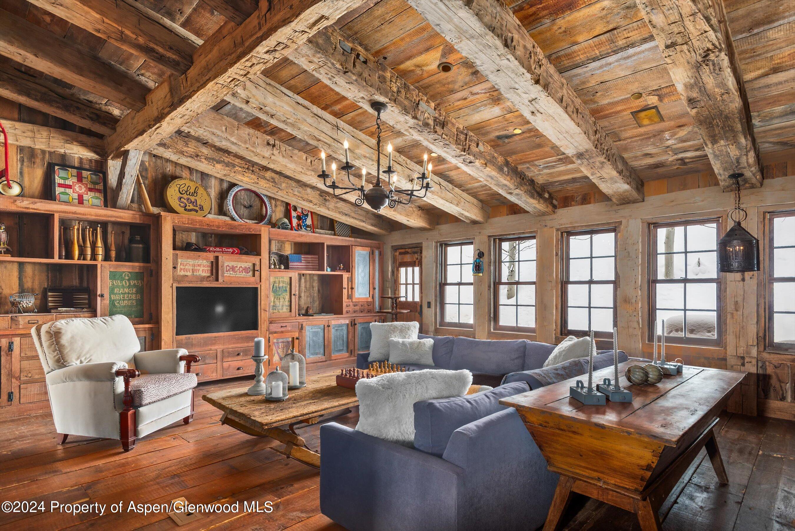 855 Moore Drive Aspen, CO 81611 - Photo 21 of 50 a living room with furniture and a large window