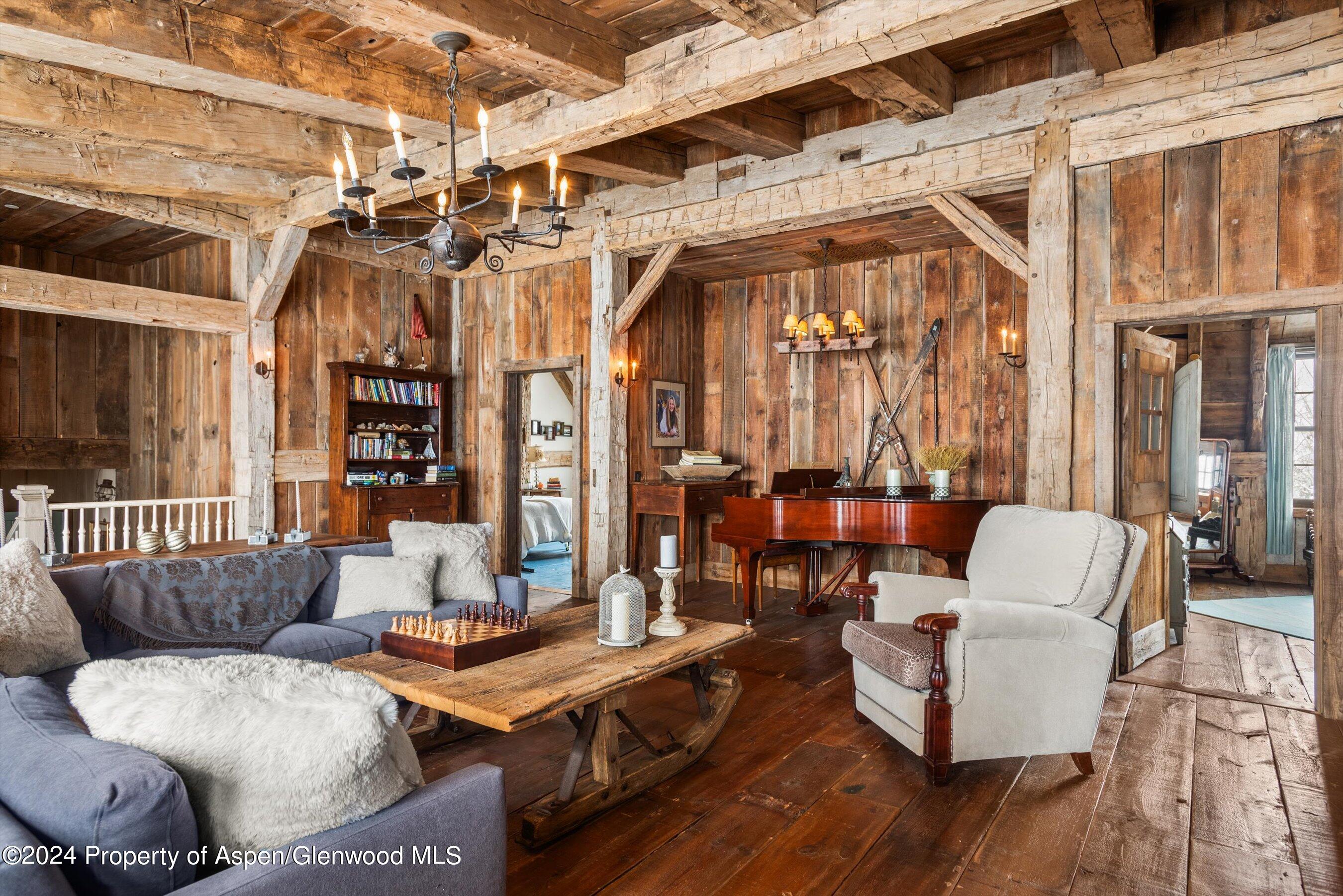 855 Moore Drive Aspen, CO 81611 - Photo 23 of 50 a living room with furniture and wooden floor