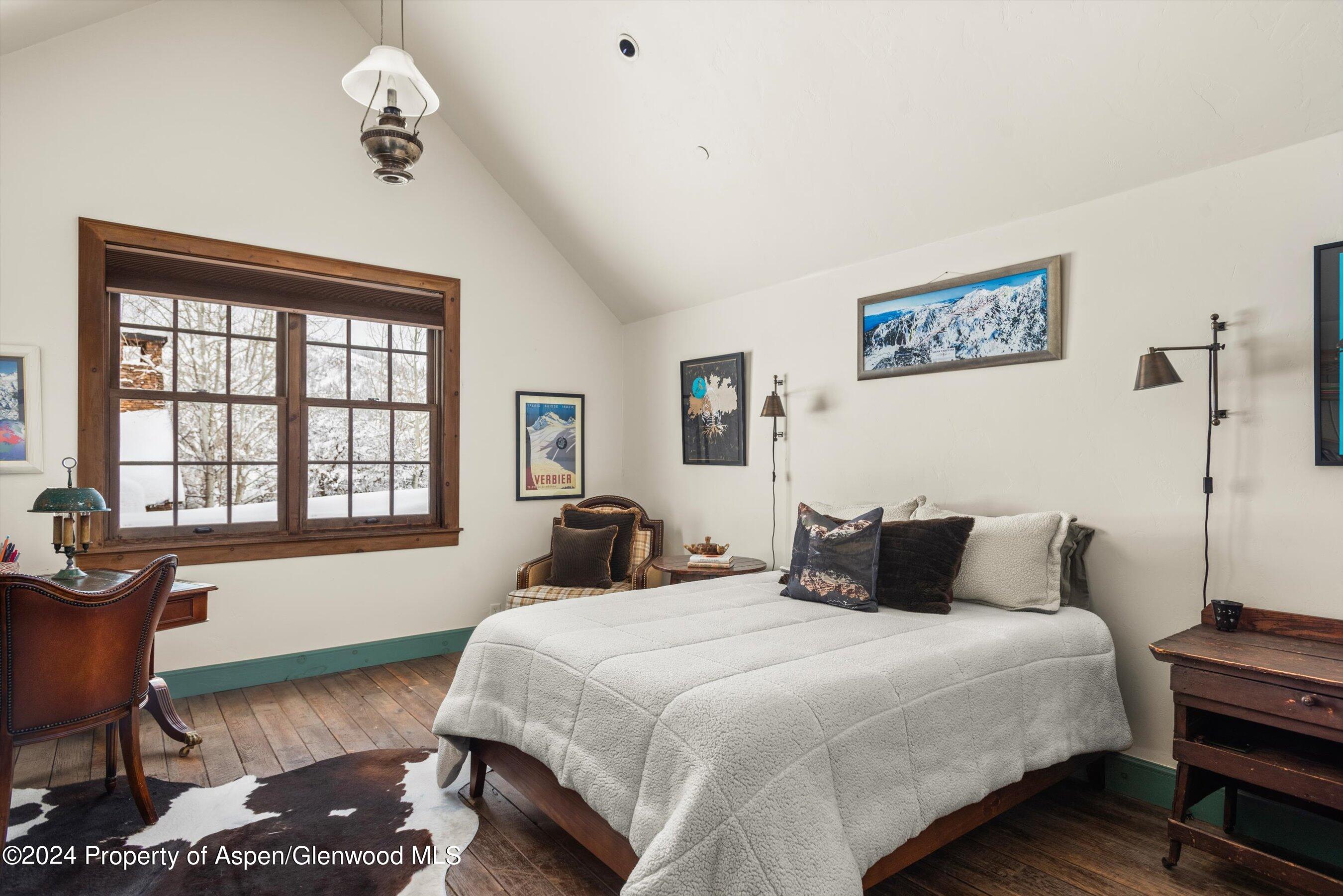 855 Moore Drive Aspen, CO 81611 - Photo 31 of 50 a bedroom with bed and a window