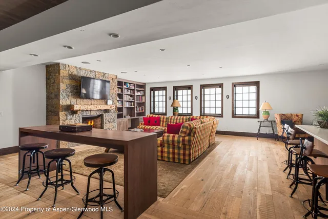 a kitchen with a table and chairs in it