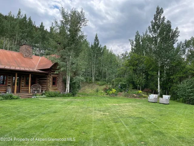 a front view of a house with garage