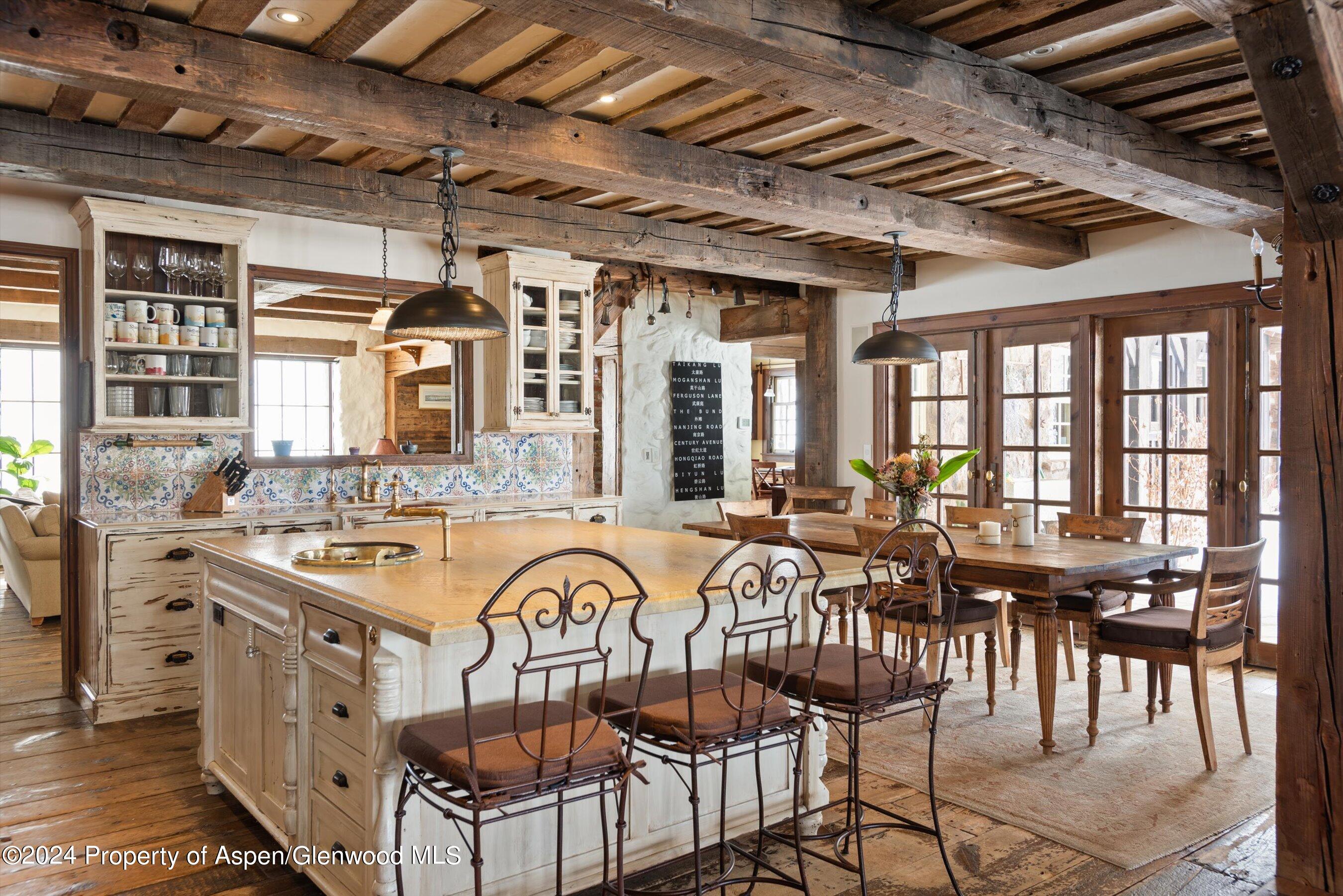 855 Moore Drive Aspen, CO 81611 - Photo 8 of 50 a view of a dining room with furniture window and outside view