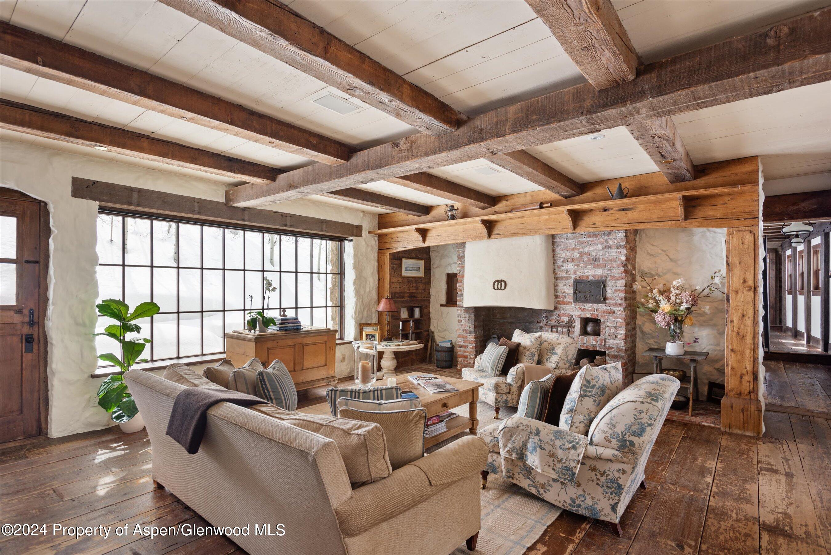 855 Moore Drive Aspen, CO 81611 - Photo 10 of 50 a living room with furniture and a large window
