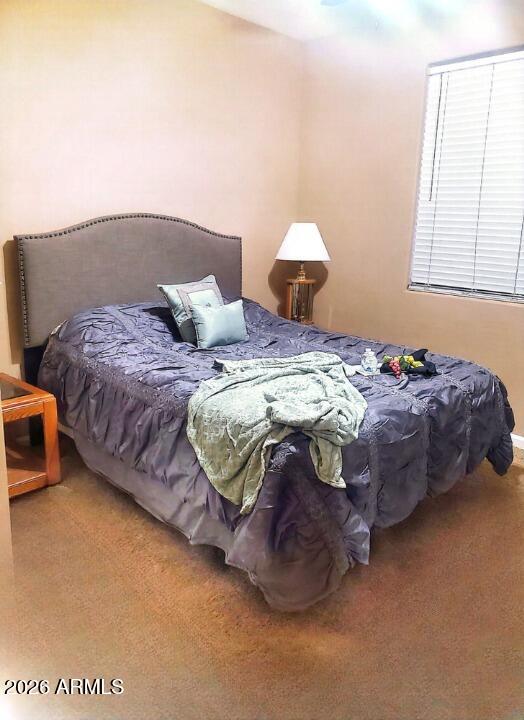 11058 East Cholla Road Mesa, AZ 85207 - Photo 11 of 22 a bedroom with a bed and a couch