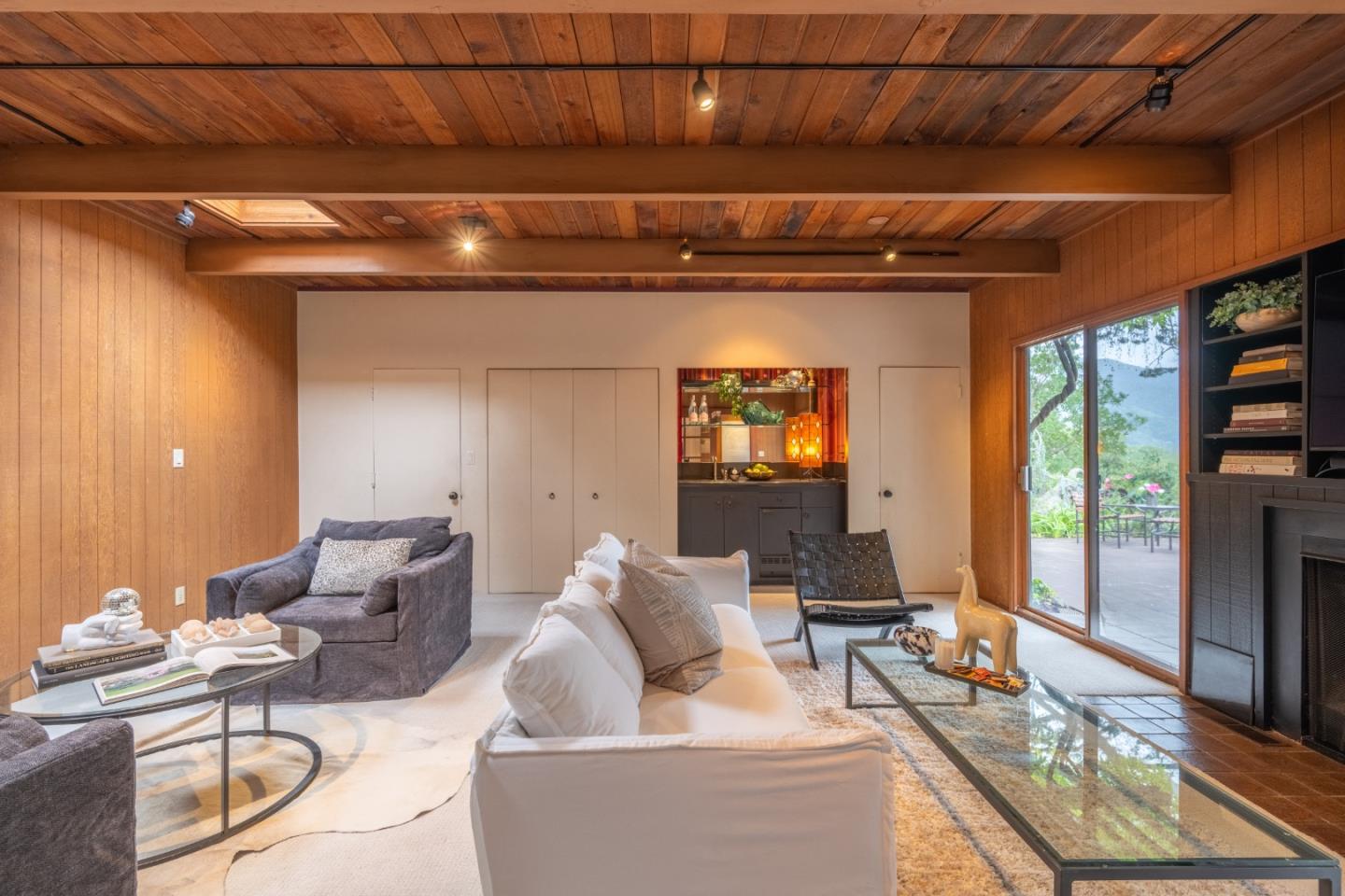 46 Middle Canyon Road Carmel Valley, CA 93924 - Photo 11 of 74 a living room with furniture and a floor to ceiling window