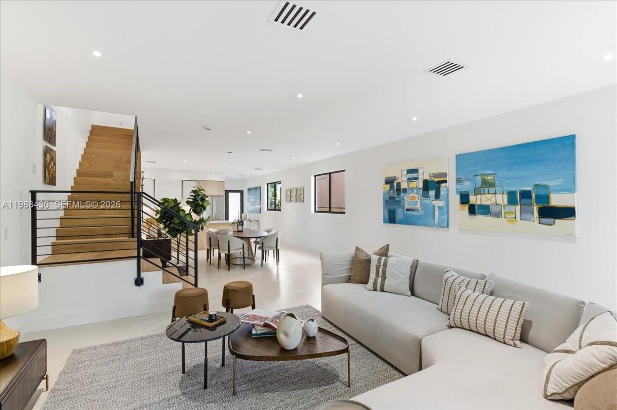 2925 Southwest 36th Avenue Miami, FL 33133 - Photo 13 of 59 a living room with furniture and wooden floor