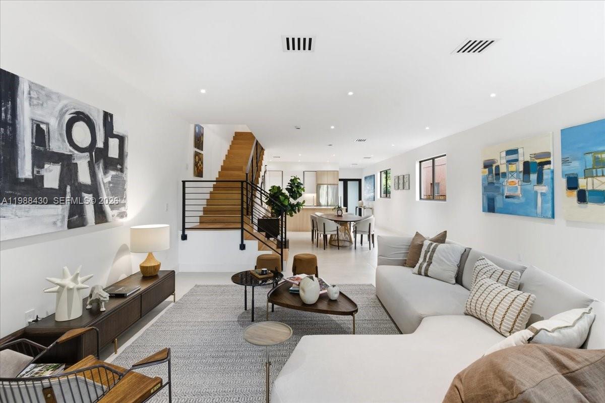 2925 Southwest 36th Avenue Miami, FL 33133 - Photo 14 of 59 a living room with furniture and wooden floor