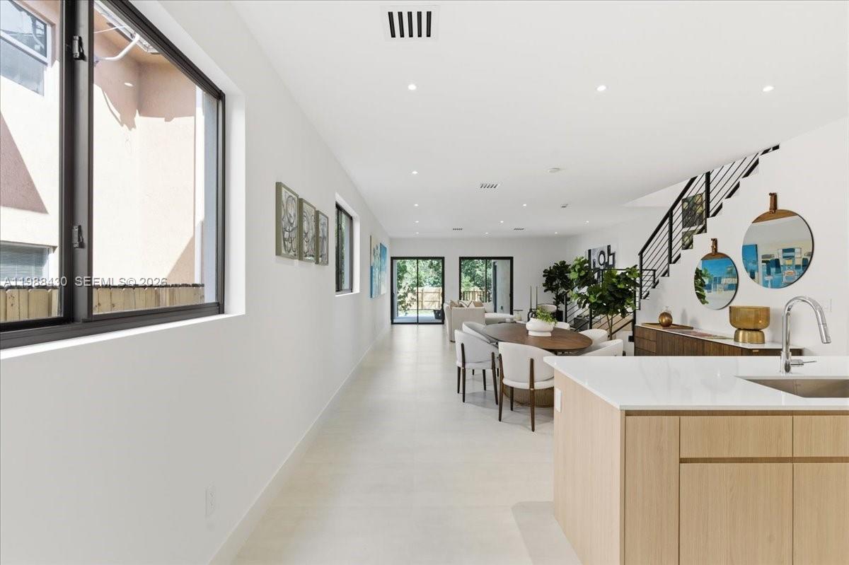 2925 Southwest 36th Avenue Miami, FL 33133 - Photo 3 of 59 a view of a living room and a window