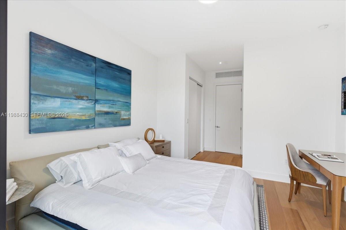 2925 Southwest 36th Avenue Miami, FL 33133 - Photo 41 of 59 a bedroom with a bed and a window