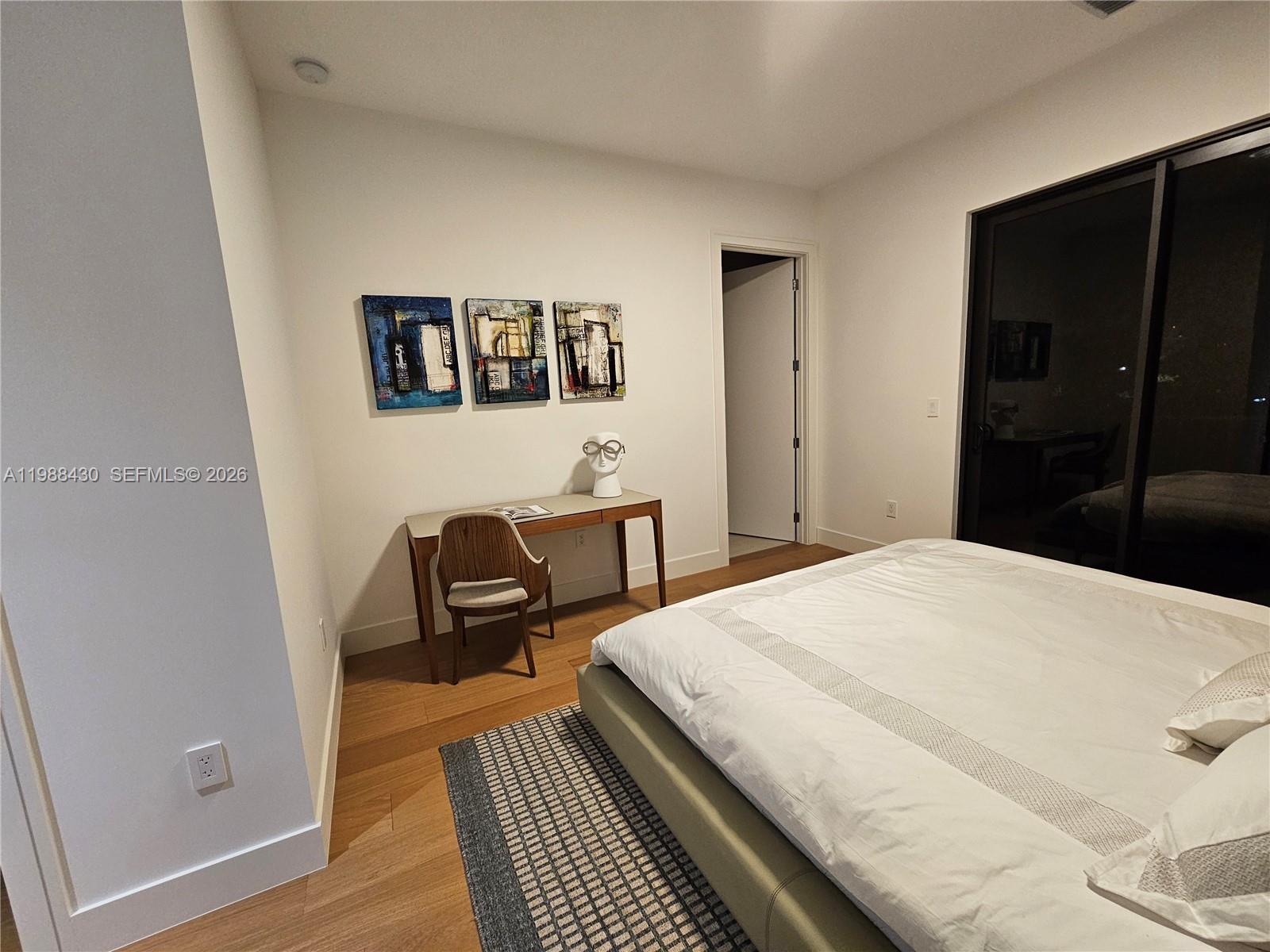 2925 Southwest 36th Avenue Miami, FL 33133 - Photo 43 of 59 a bedroom with a bed and a view of bathroom