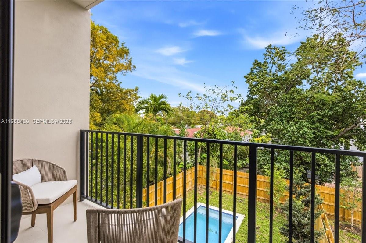 2925 Southwest 36th Avenue Miami, FL 33133 - Photo 46 of 59 a view of a balcony with lake view