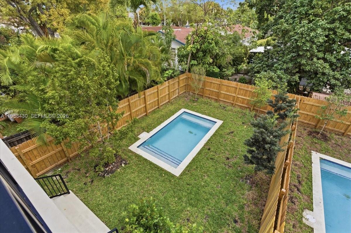 2925 Southwest 36th Avenue Miami, FL 33133 - Photo 47 of 59 a view of a yard with a tree