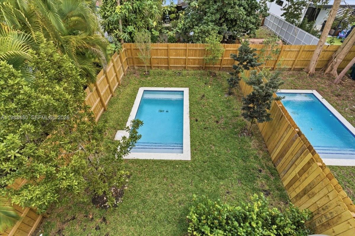 2925 Southwest 36th Avenue Miami, FL 33133 - Photo 48 of 59 a view of a yard with plants