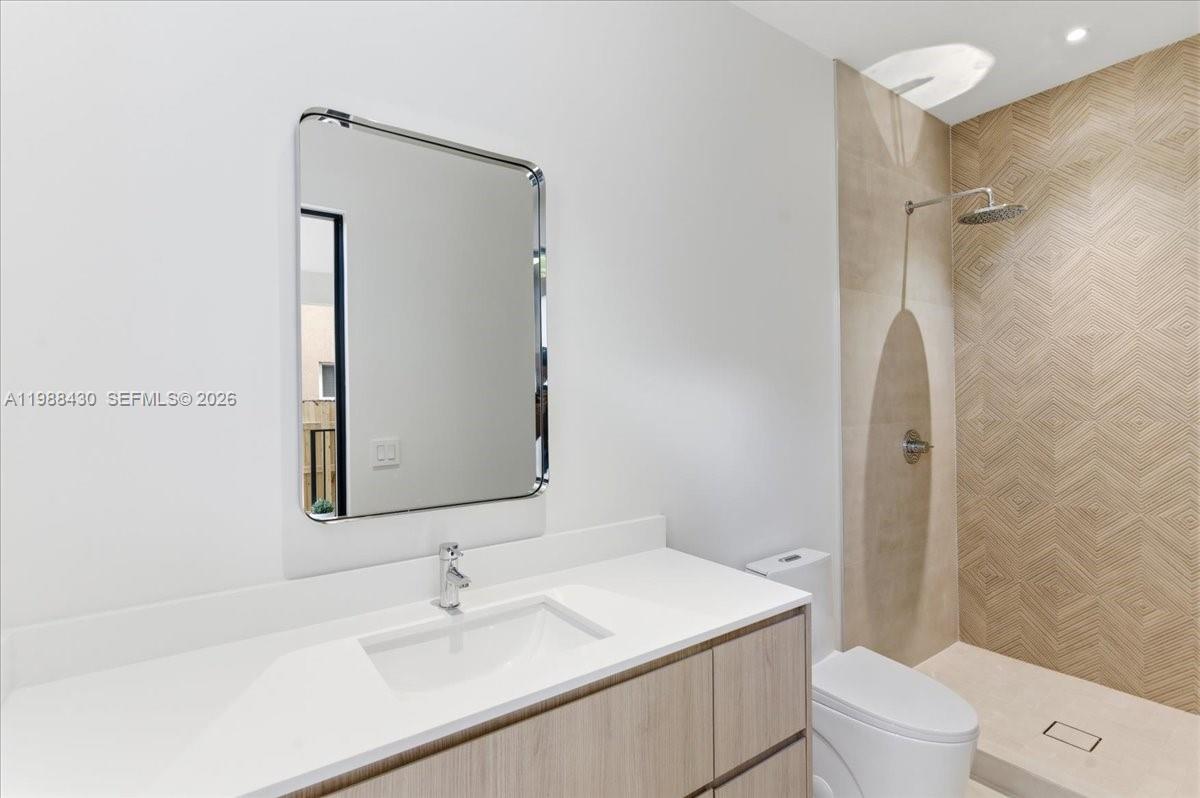 2925 Southwest 36th Avenue Miami, FL 33133 - Photo 57 of 59 a bathroom with a sink toilet and shower