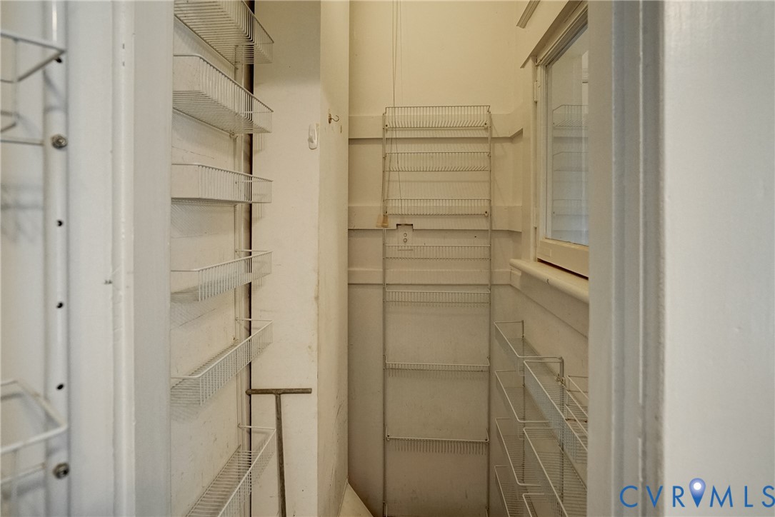 10024 Washington Road Glen Allen, VA 23060 - Photo 25 of 47 Built-in wire shelving, window, and white walls