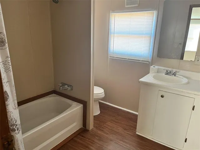 a bathroom with a sink and a bathtub