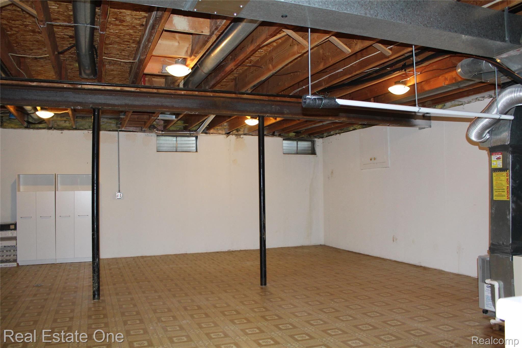 744 Eastbridge Court, Unit 103 Rochester, MI 48307 - Photo 17 of 23 basement.JPG