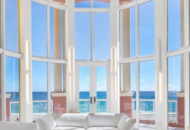 2140 North Ocean Boulevard, Unit V Fort Lauderdale, FL 33305 - Photo 1 of 63 a view of a livingroom with furniture and windows