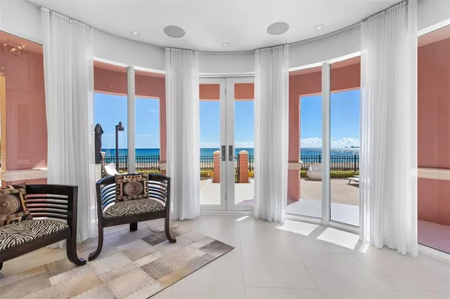 a kitchen with a large window and a sink