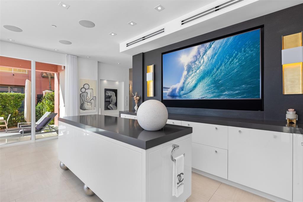 2140 North Ocean Boulevard, Unit V Fort Lauderdale, FL 33305 - Photo 15 of 63 a kitchen with a large window and a sink