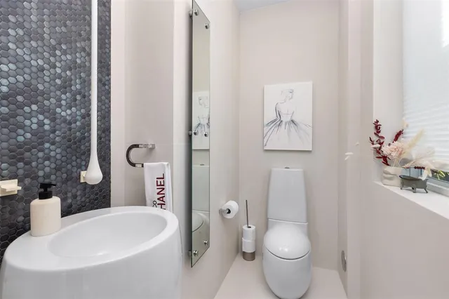 a living room with furniture fireplace and flat screen tv