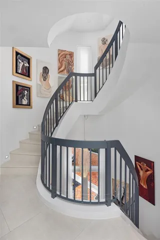 a bathroom with a bathtub and shower