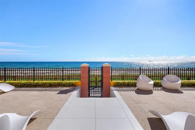 a city street lined with buildings and trees