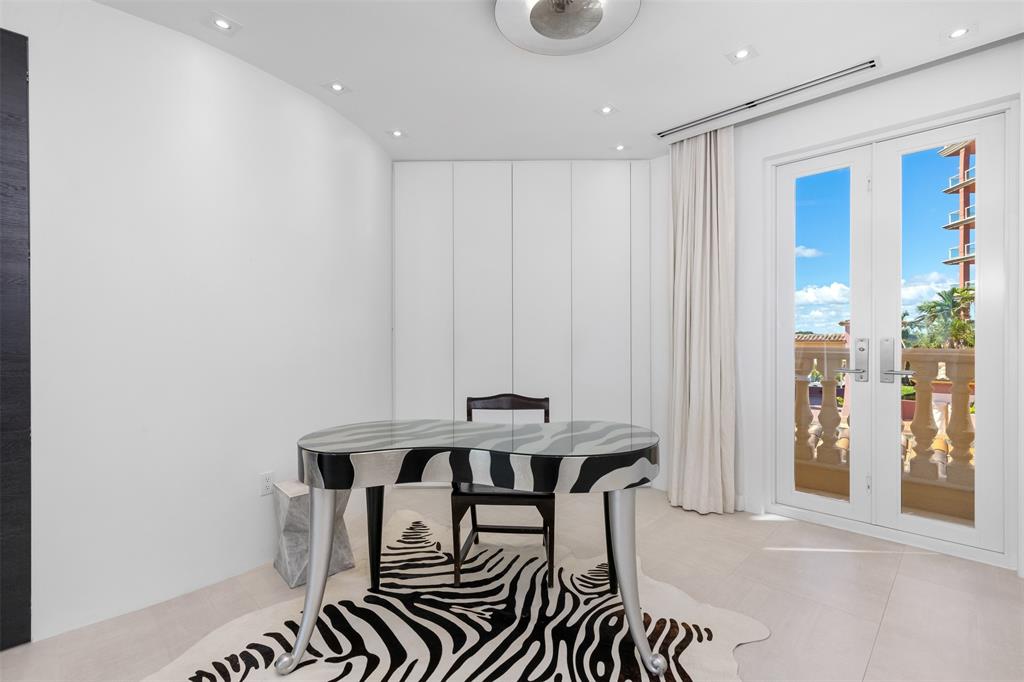 2140 North Ocean Boulevard, Unit V Fort Lauderdale, FL 33305 - Photo 43 of 63 a view of a room with furniture and window