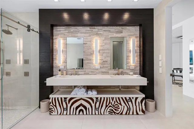 a view of a patio with a dining table and chairs