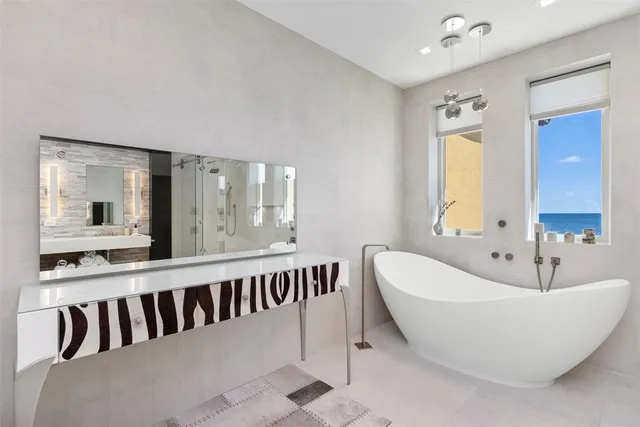 a utility room with sink dryer and washer