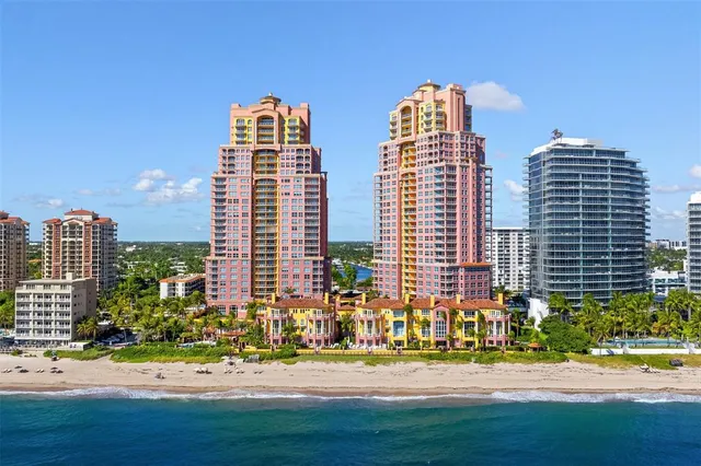 a view of a hallway with seating area