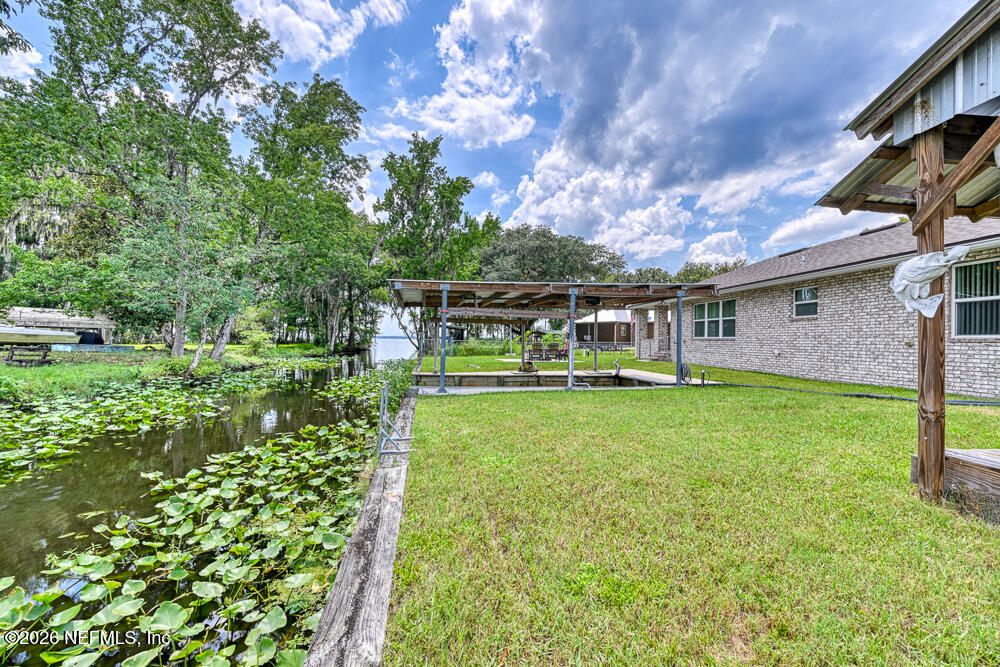 7837 Rusty Anchor Road St. Augustine, FL 32092 - Photo 21 of 41 Backyard showing canal