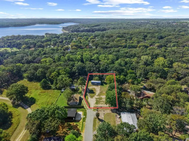 an aerial view of a house with a garden