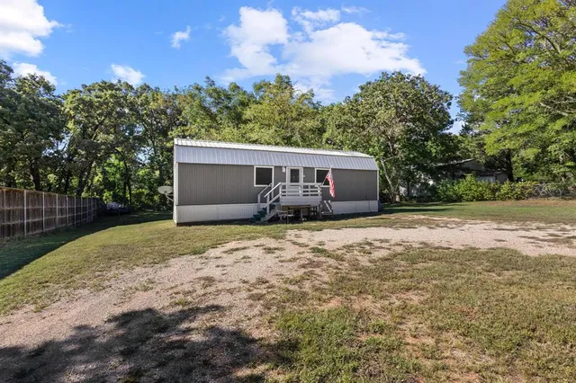 a house view with a garden space