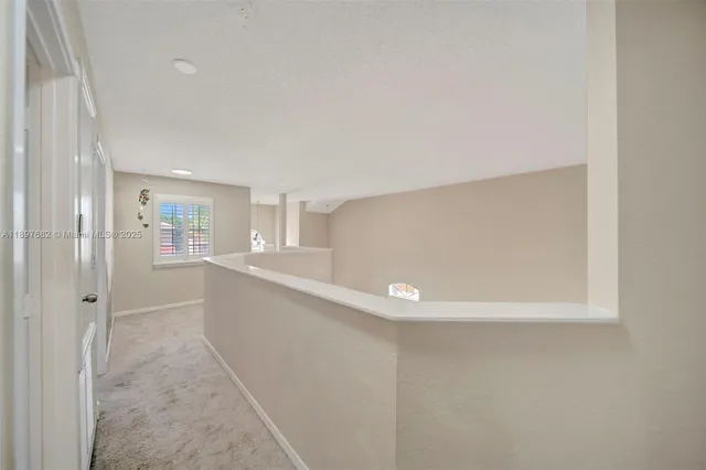 a bed room with a bed and a tv