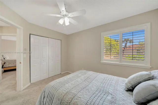a bath room with a bath tub and a shower