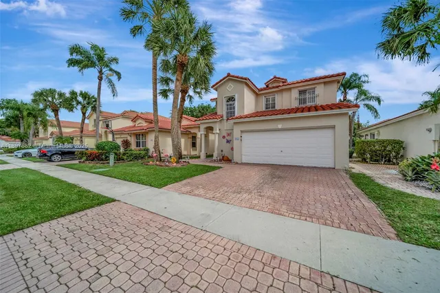 a view of a green field with clear sky