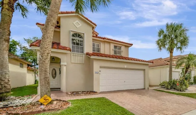 a view of a living room and dining room