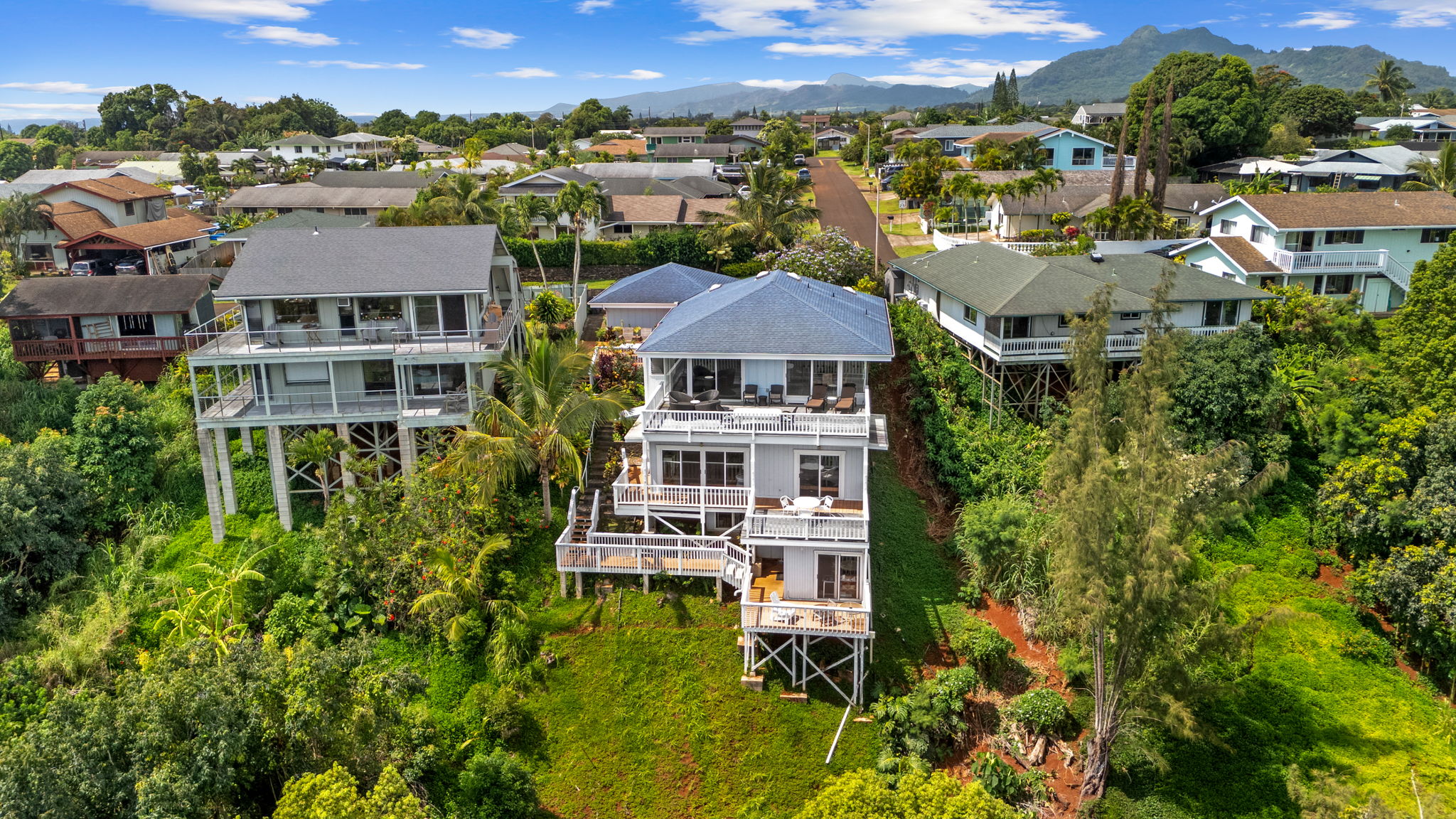 5366 Kumole Street Kapaa, HI 96746 - Photo 1 of 30 an aerial view of a house with a garden