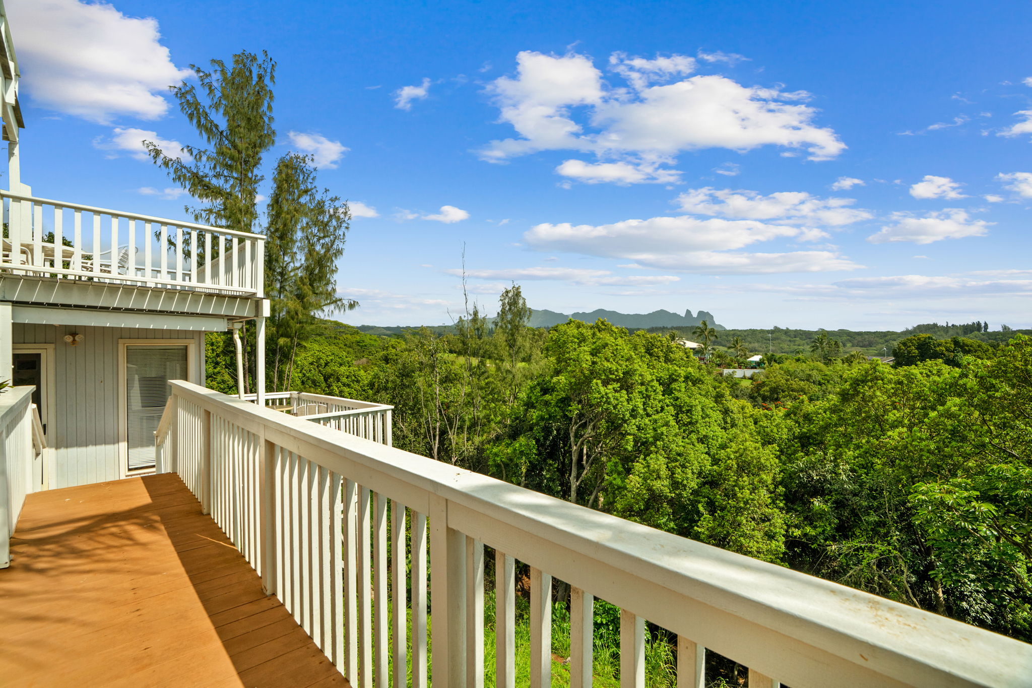 5366 Kumole Street Kapaa, HI 96746 - Photo 24 of 30 a view of a balcony with wooden fence