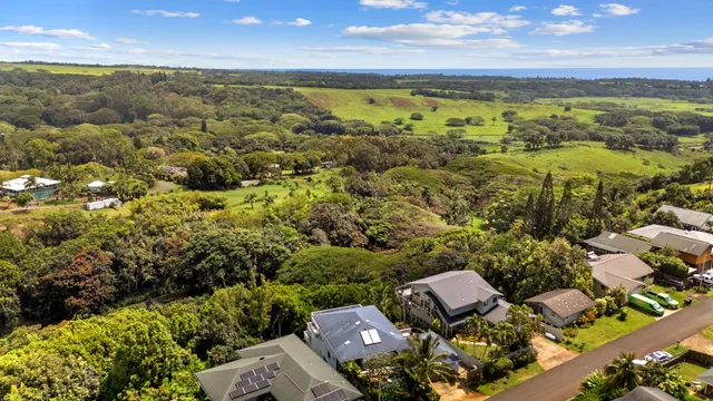 a view of a city with an ocean