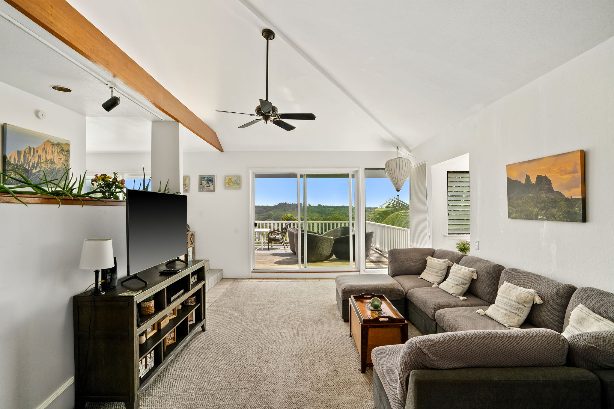 5366 Kumole Street Kapaa, HI 96746 - Photo 3 of 30 a living room with furniture and a flat screen tv