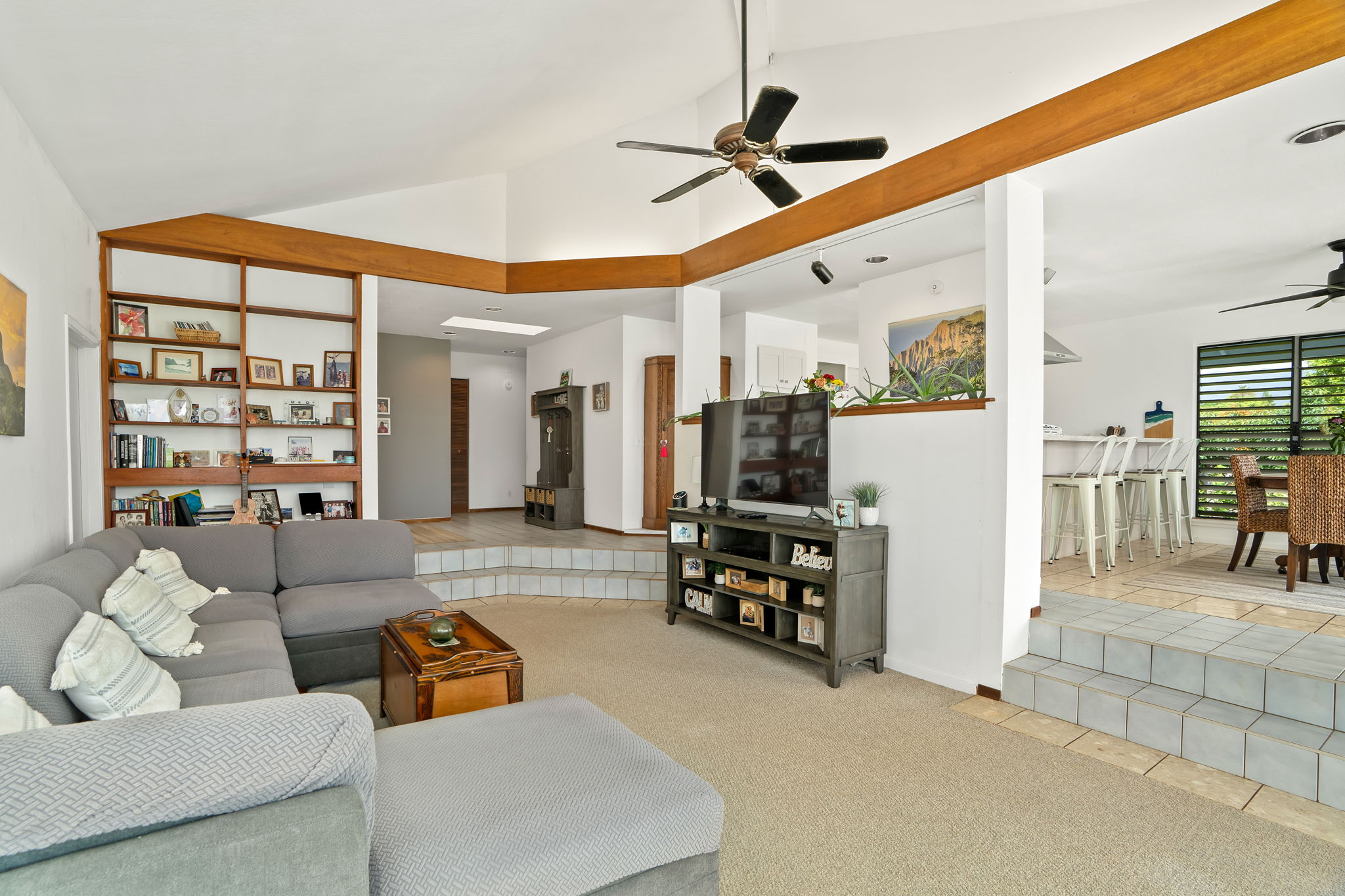 5366 Kumole Street Kapaa, HI 96746 - Photo 4 of 30 a living room with furniture and a flat screen tv